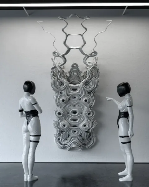 D-Flow layered wall sculpture displayed between two human figures