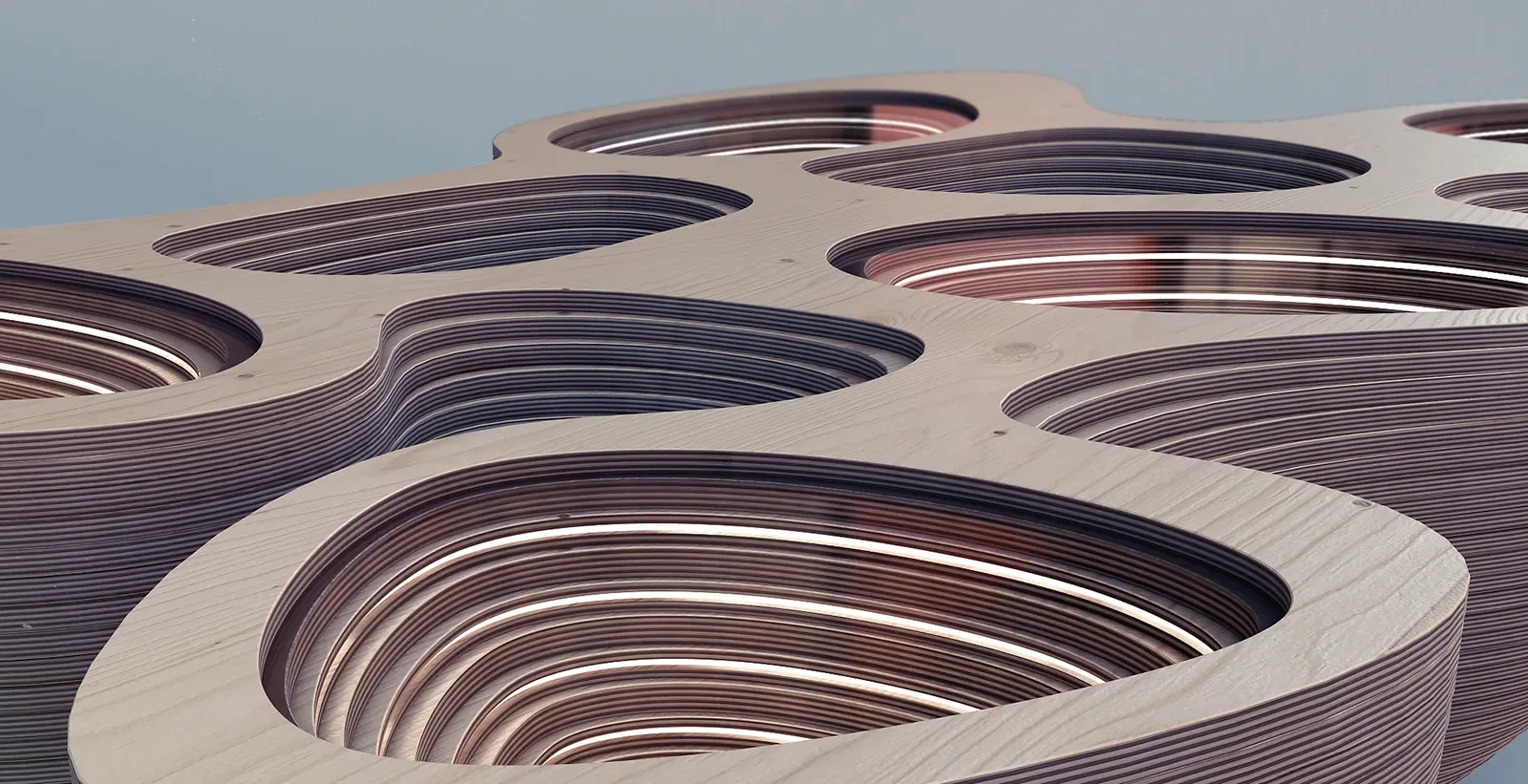 Rain Gatherer Table, close-up of a recessed plywood basin formed by concentric CNC-cut layers.