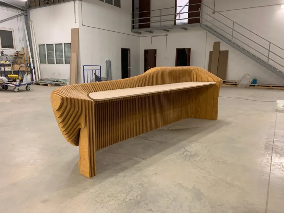 G Reception Desk, rear workshop perspective showing the timber worktop and support structure.