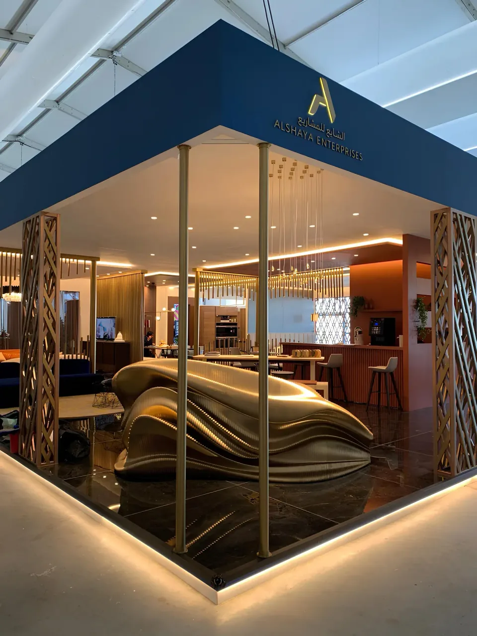 D Reception Desk, reception installation enclosed by a glass pavilion.