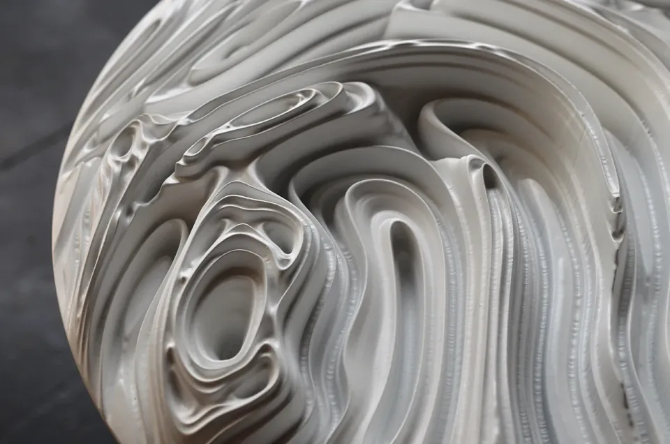 Jupiter Round Panel 02, close-up of a spiral recess within the relief.