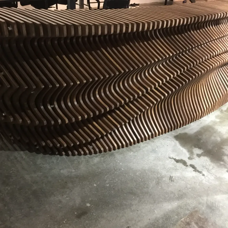 Dubai Reception Desk, unfinished ribbed counter section during workshop assembly.