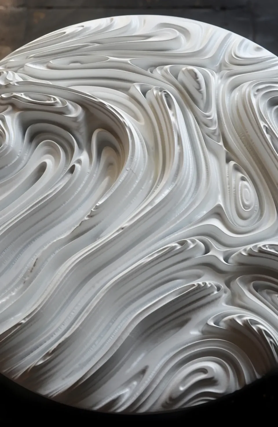 Close-up of broad circular ridges across a Jupiter wall panel relief.